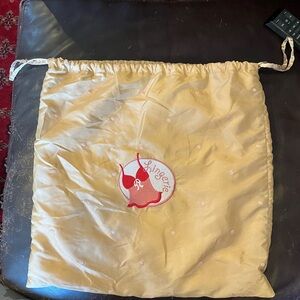 Drawstring lingerie bag with red logo